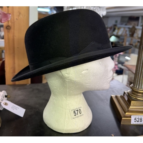 570 - A Dunn & Co London 'The perfectas hat' bowler hat (long oval) in very good condition