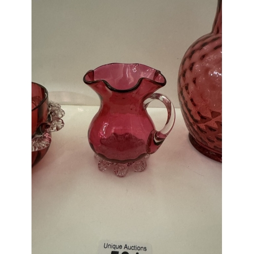 581 - 3 items of cranberry glass, 1 A/F