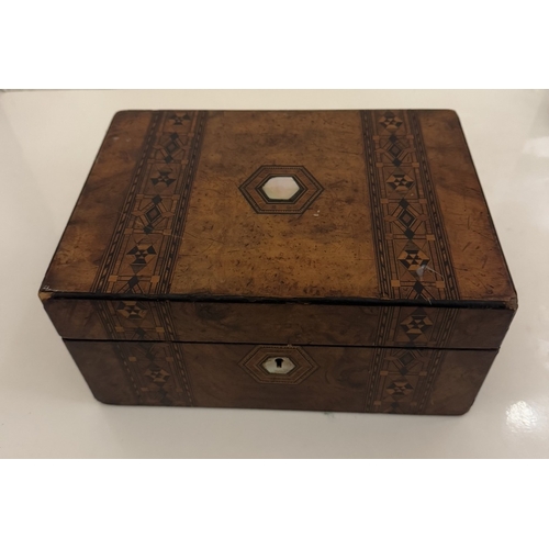 601 - A Victorian inlaid sewing box & contents