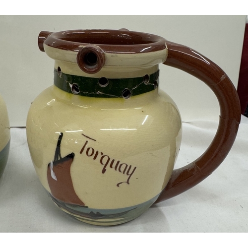 622 - 3 Vintage Torquay ware puzzle jugs