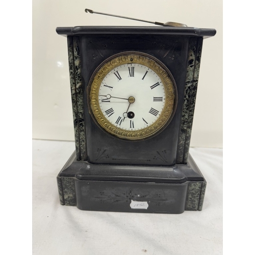 630 - A Victorian black slate mantle clock