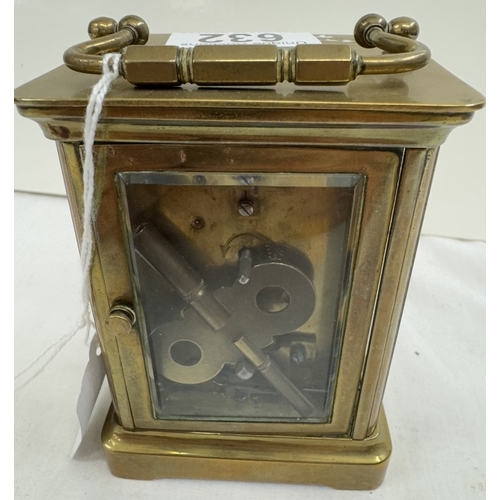 632 - An Edwardian brass carriage clock with key