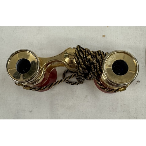 633 - A pair of good quality opera glasses