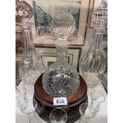 636 - 3 Cut glass decanters with sherry glasses