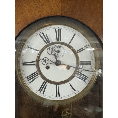 654 - A Victorian double regulator Vienna wall clock