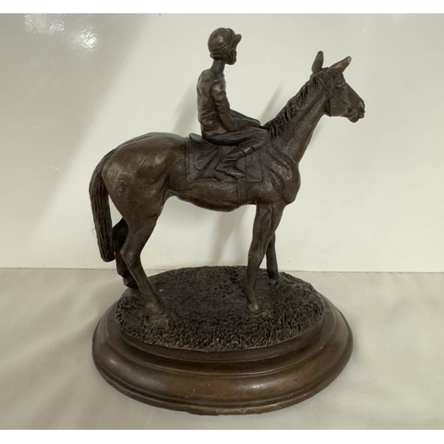 671 - A bronze racehorse with jockey