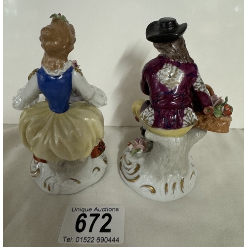 672 - A pair of Sitzendorf boy & girl figurines