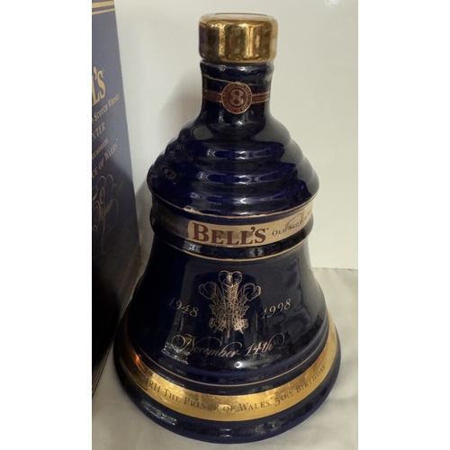 675 - A boxed Bells extra special old Scotch whiskey decanter 'The Prince of Wales 50th birthday' (This bo... 