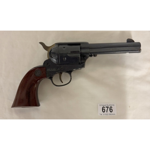 676 - A Daisy model 179 peacemaker, .177 Cal BB revolver with holster