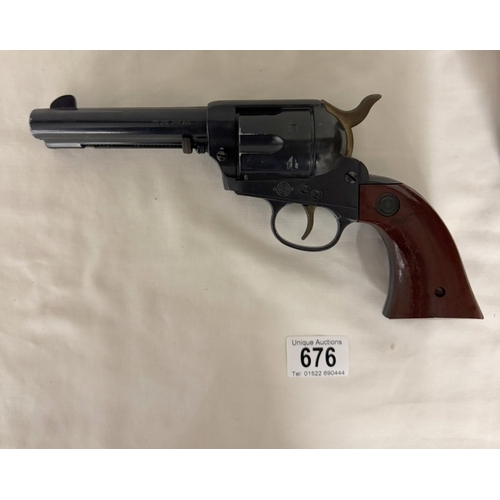 676 - A Daisy model 179 peacemaker, .177 Cal BB revolver with holster