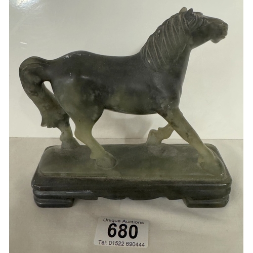 680 - An early carved soapstone figure of a pony/horse