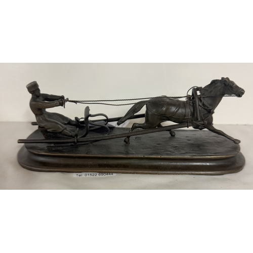 681 - A signed Russian bronze Cossack with horse sled, Manor of Vasily Grachev