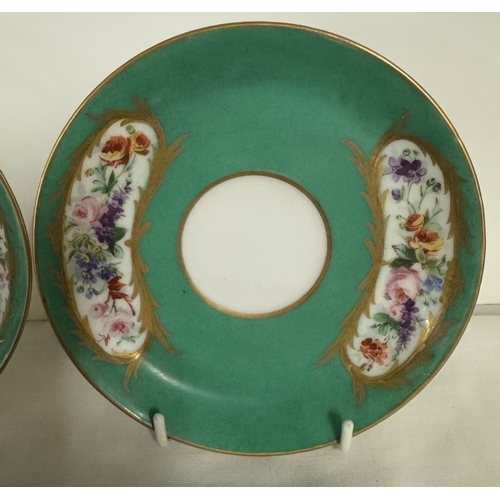 688 - A pair of 18th century French Sevres porcelain cups & saucers portraying courting couples