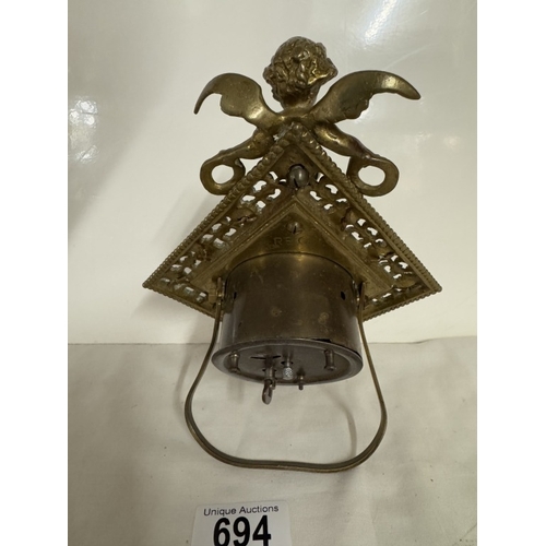 694 - A diamond shaped brass clock