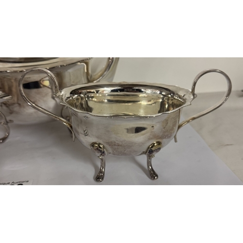 722 - A 3 piece silver plate teapot, sugar bowl & milk jug