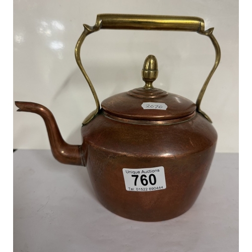 760 - A copper kettle with brass handle with acorn knob