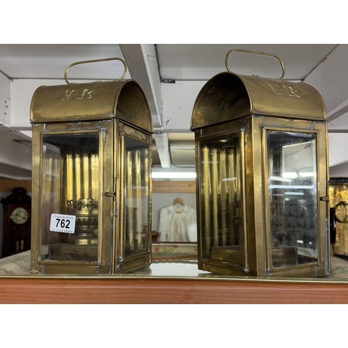 762 - A pair of brass electric lanterns