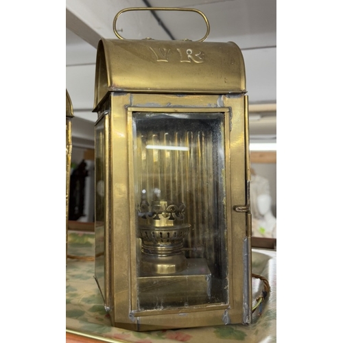 762 - A pair of brass electric lanterns