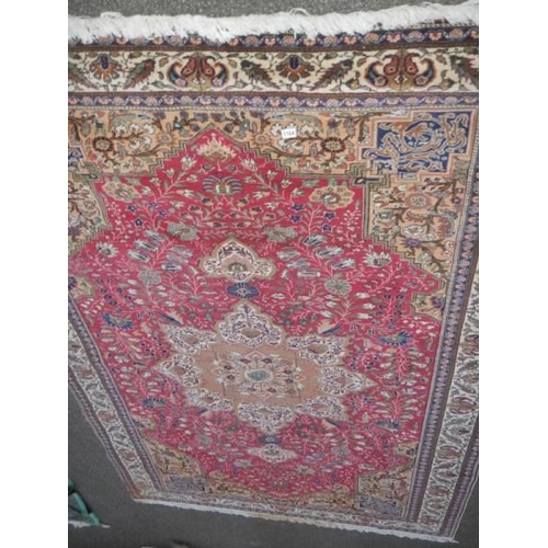 1164 - A red patterned rug, 229 x 198 cm