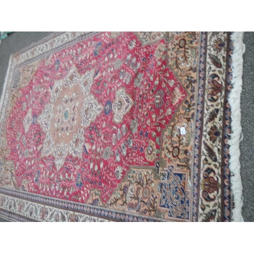 1164 - A red patterned rug, 229 x 198 cm