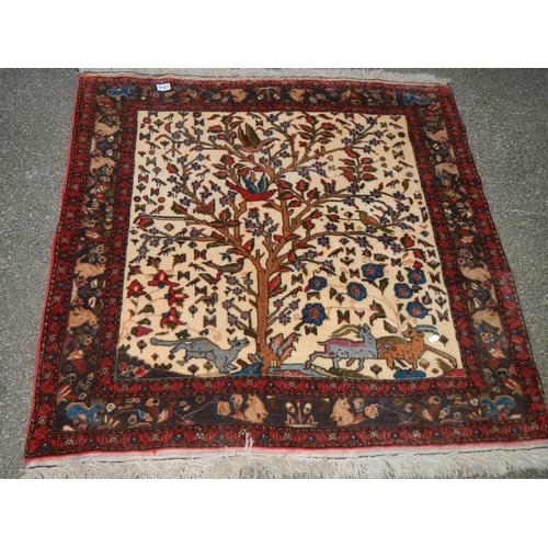 1167 - A 'Tree of Life' patterned rug, 110 x 110 cm.