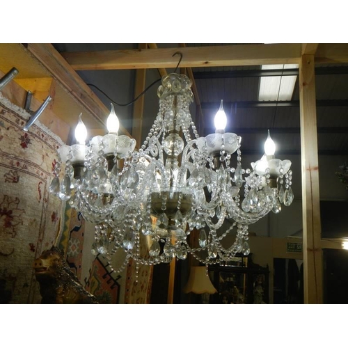 1170 - A good quality 10 light glass chandelier. Fully restored.