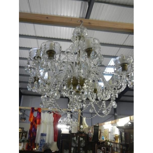 1172 - A good quality 10 light glass chandelier. Fully restored.