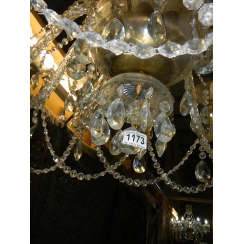 1173 - A good quality 10 light glass chandelier. Fully restored.