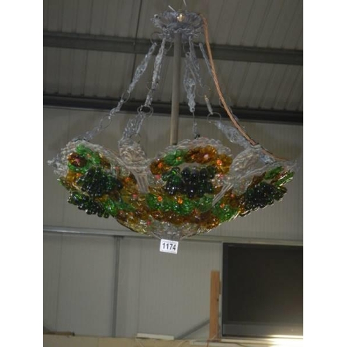 1174 - An early 20th century coloured glass ceiling light.