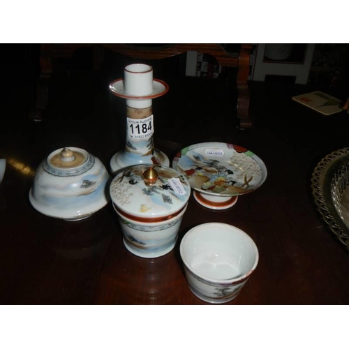 1184 - An oriental porcelain dressing table set.