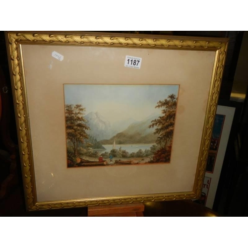 1187 - A gilt framed and glazed mountain lake scene, 51 x 48 cm.