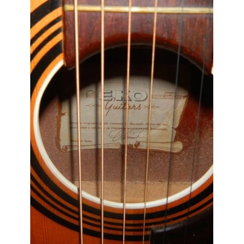 1189 - An EKO accoustic guitar with soft case.