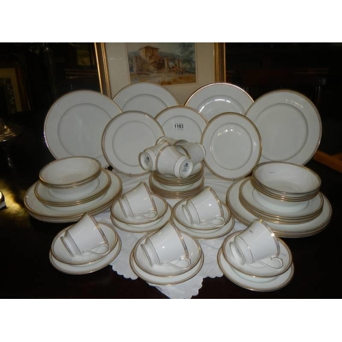 1193 - Approximately 45 pieces of Aynsley Jubilee Gold dinner ware.