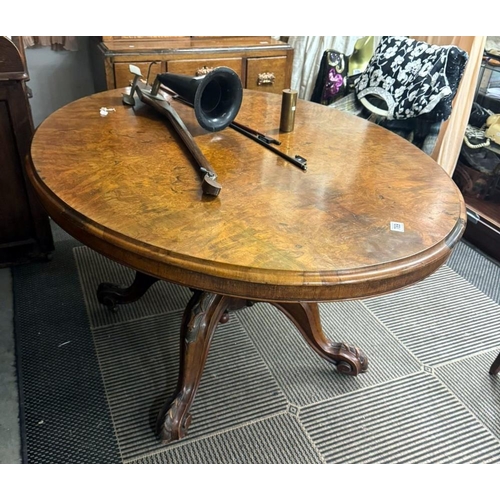 789 - A Victorian mahogany tip up table with walnut veneered top