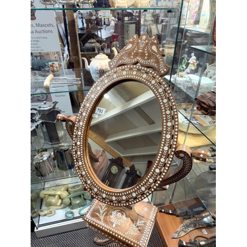 793 - An Eastern influenced teak dressing table mirror with inlaid decoration on 4 legs