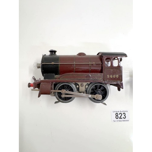 823 - A Hornby O gauge 3 rail locomotive & tender (untested)