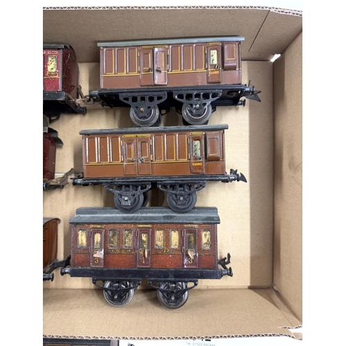 842 - 7 early Hornby O gauge coaches with opening doors