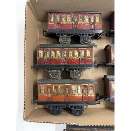 842 - 7 early Hornby O gauge coaches with opening doors