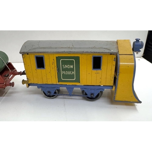 855 - A pre war Hornby O gauge Cadburys Chocolate, Snow plough & Castrol barrel load