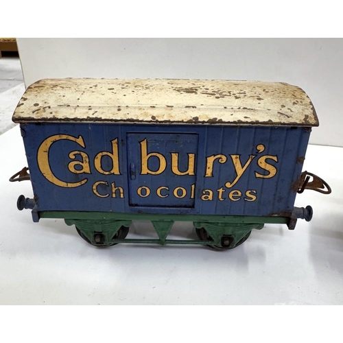 855 - A pre war Hornby O gauge Cadburys Chocolate, Snow plough & Castrol barrel load