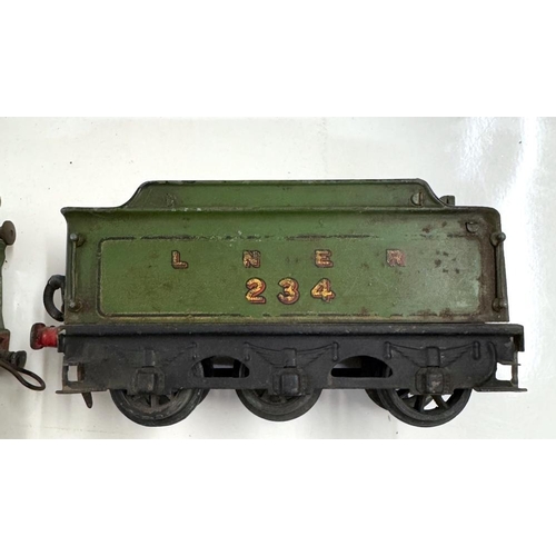 856 - 2 Hornby O gauge LNER clockwork locomotives with tenders. Springs are ok, no keys