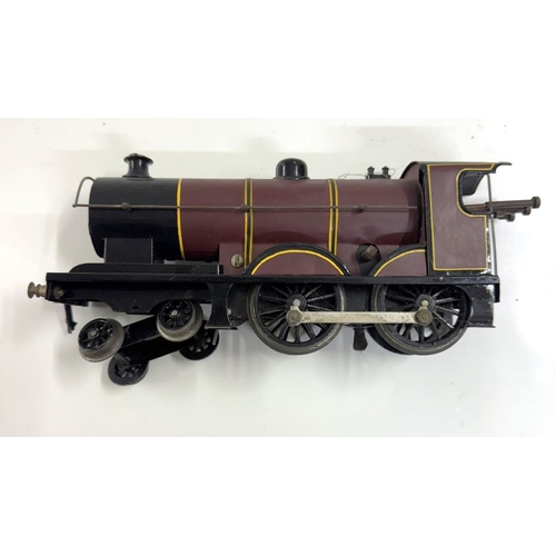 867 - A repainted Hornby O gauge locomotive & tender. No key, spring A/F