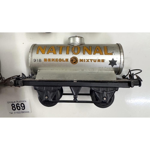 869 - 4 Hornby O gauge fuel tankers including Pool, National & Mobil Oil