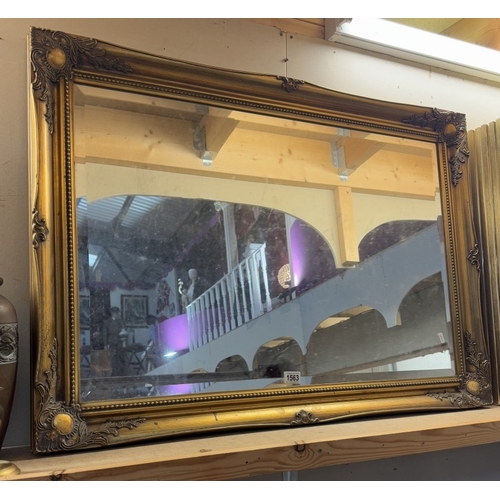 A Large Gilt Framed Bevel Edge Mirror