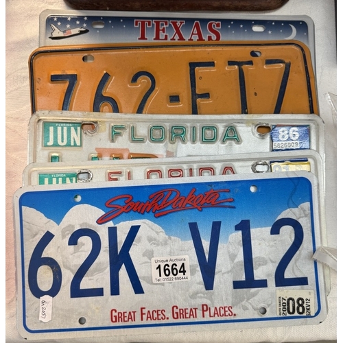 1664 - A quantity of USA number plates