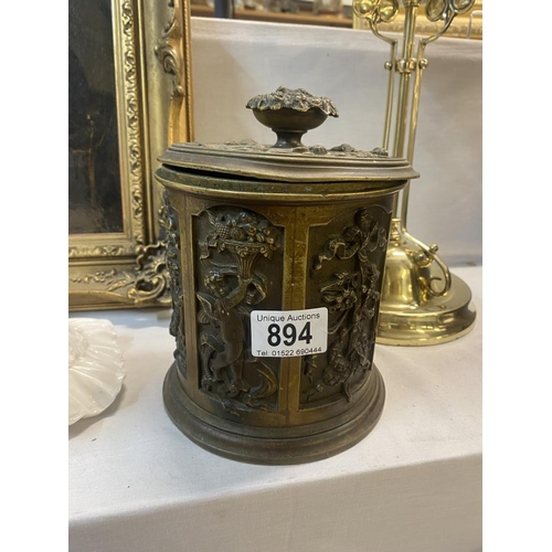 894 - A Victorian bronze tobacco pot complete, 20cm tall