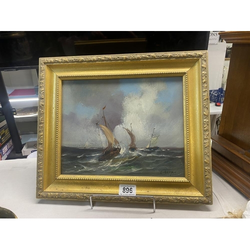 896 - A gilt framed oil on board of sailing boats