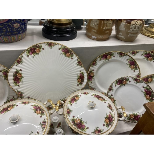 904 - A collection of Royal Albert Old Country Roses china including platter, 6 dinner plates & tureens et... 