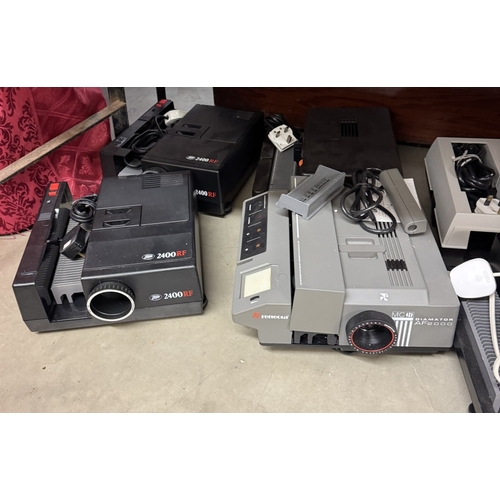 1674 - 8 slide projectors, 2 cassette recorders & a cased pair of Realistic speakers