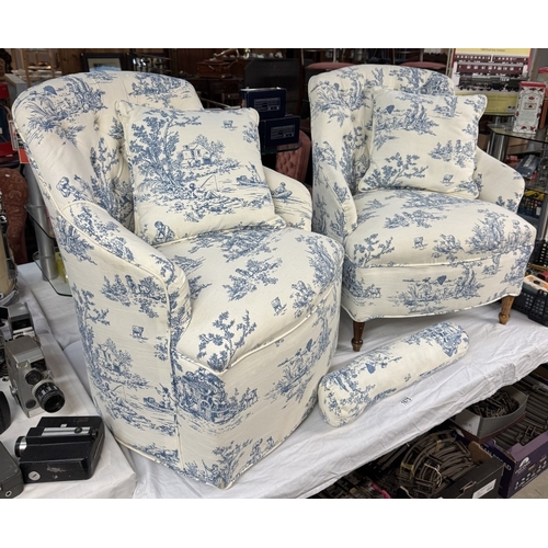 1675 - A pair of blue & white fabric covered bedroom wing armchairs with cushions